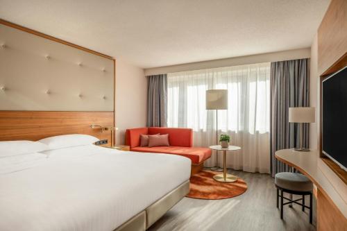 Habitación Executive con 1 cama extragrande y acceso al club lounge M del hotel Vienna Marriott
