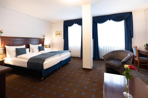 Habitación familiar Premium con cama extragrande y sofá cama del hotel Garner Vienna - Prinz Eugen by IHG. Foto 8