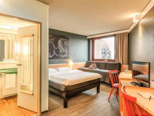 Habitación Estándar - 1 cama doble y 1 individual del hotel Ibis Wien Mariahilf. Foto 1