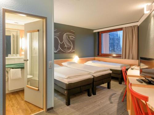 Habitación Estándar - 1 cama doble y 1 individual del hotel Ibis Wien Mariahilf. Foto 7