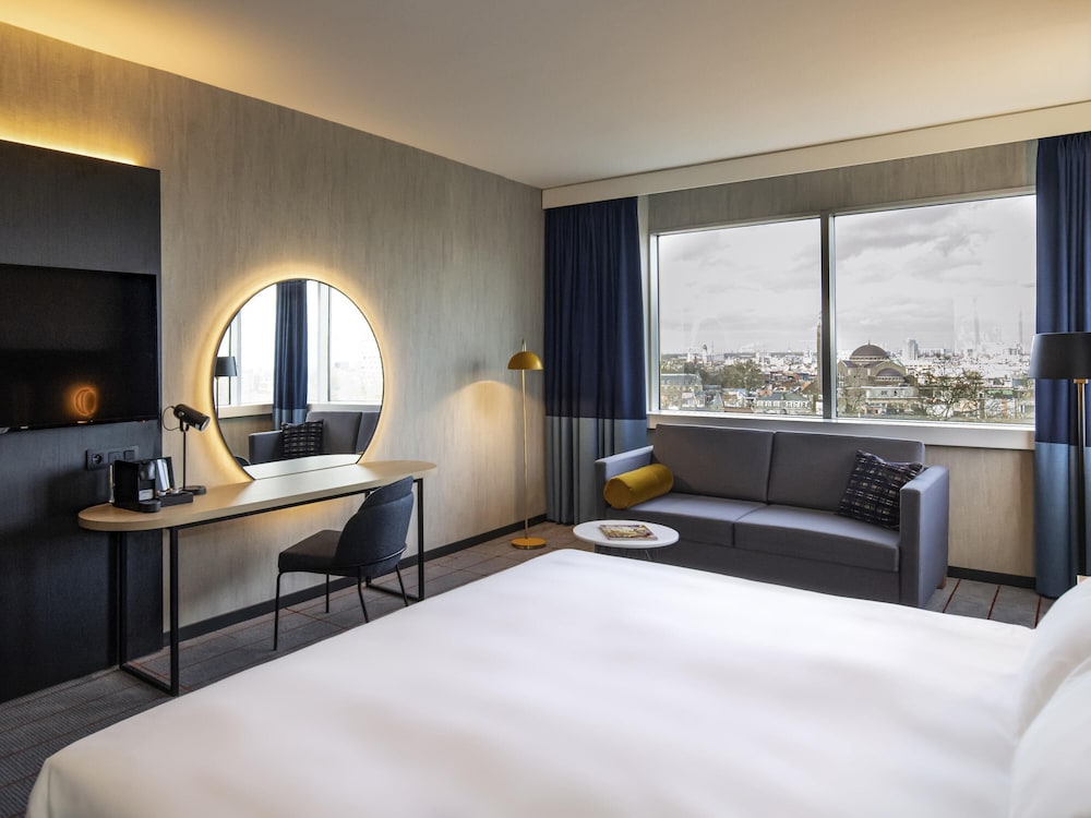 Habitación Privilegio con 1 cama King Size con vistas al parque del hotel Mercure Antwerp City South. Foto 1