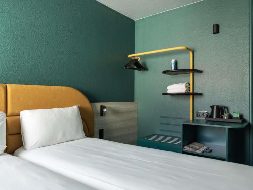 Habitación Estándar - 2 camas individuales del hotel ibis Styles Brugge Centrum. Foto 3