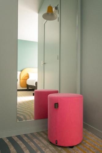 Habitación Doble Deluxe adaptada para personas con discapacidad del hotel ibis Styles Brugge Centrum. Foto 7