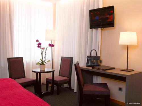 Habitación Doble adaptada para personas con movilidad reducida del hotel Martin's Brugge. Foto 1