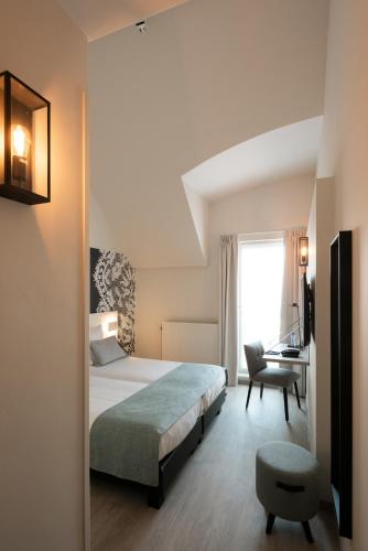 Habitación Doble con bañera del hotel Martin's Brugge. Foto 5
