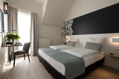 Habitación Doble con ducha del hotel Martin's Brugge. Foto 5