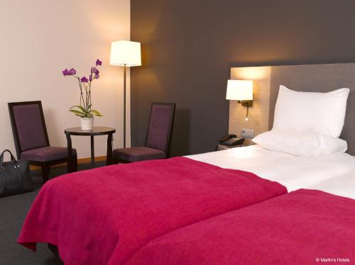 Habitación Doble Confort con ducha del hotel Martin's Brugge. Foto 3