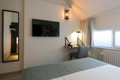 Habitación Confort Doble con bañera del hotel Martin's Brugge. Foto 3