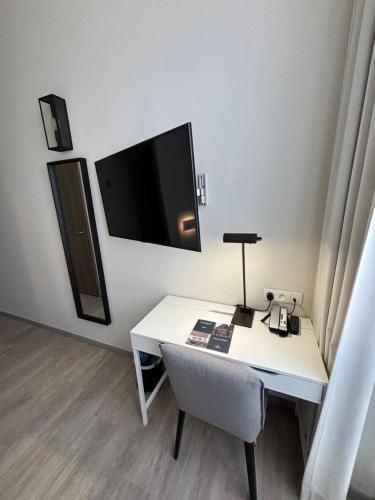 Habitación Individual con ducha del hotel Martin's Brugge. Foto 4