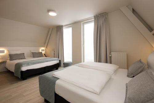 Habitación cuádruple del hotel Martin's Brugge. Foto 3