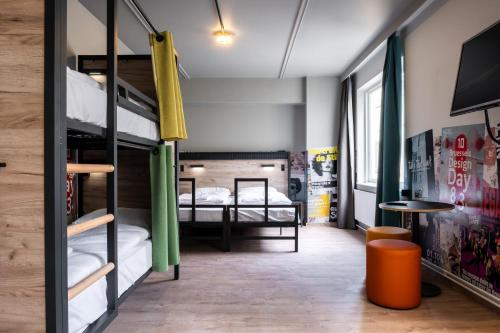 Habitación Familiar del hotel A&O Brussels Centrum. Foto 10