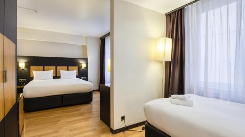 Habitación Triple Estándar del hotel A&O Brussels Centrum. Foto 4