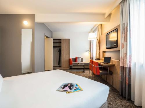 Habitación Doble Estándar - Adaptada para personas con movilidad reducida del hotel Novotel Brussels City Centre. Foto 2