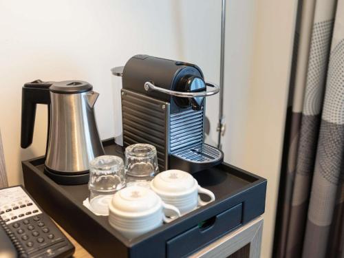 Habitación Executive del hotel Novotel Brussels City Centre. Foto 1