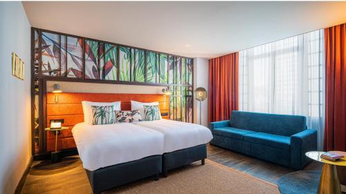 Habitación Doble Premium con sofá cama - 2 camas del hotel Indigo Brussels - City, An Ihg. Foto 2