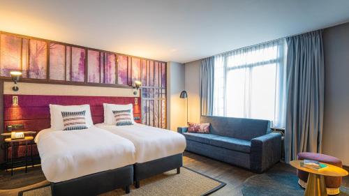 Habitación Doble Premium con sofá cama - 2 camas del hotel Indigo Brussels - City, An Ihg. Foto 4