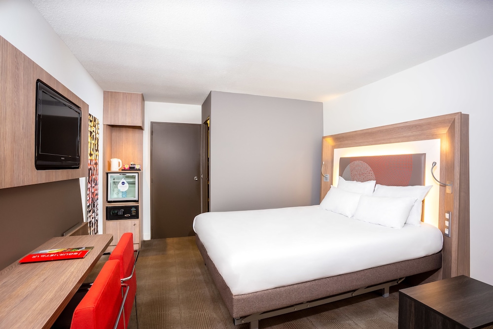 Habitación superior, 1 cama doble con sofá cama del hotel Novotel Brussels Off Grand Place. Foto 2