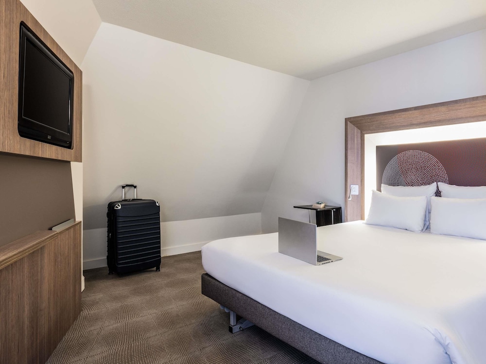 Habitación superior, varias camas, accesible para personas con discapacidad del hotel Novotel Brussels Off Grand Place. Foto 5