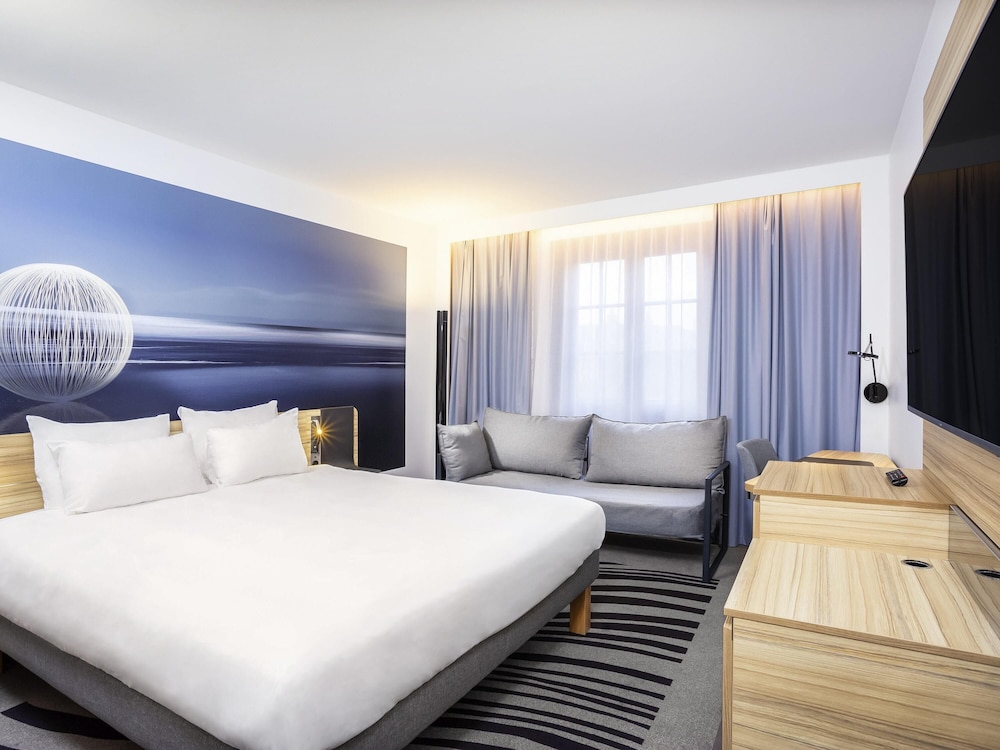 Habitación superior, 1 cama doble con sofá cama del hotel Novotel Brussels Off Grand Place. Foto 5