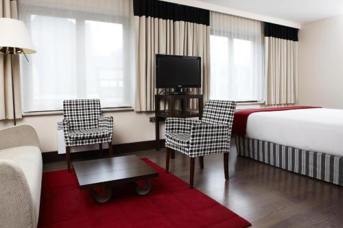 Suite Junior del hotel Nh Brussels Grand Place Arenberg. Foto 8
