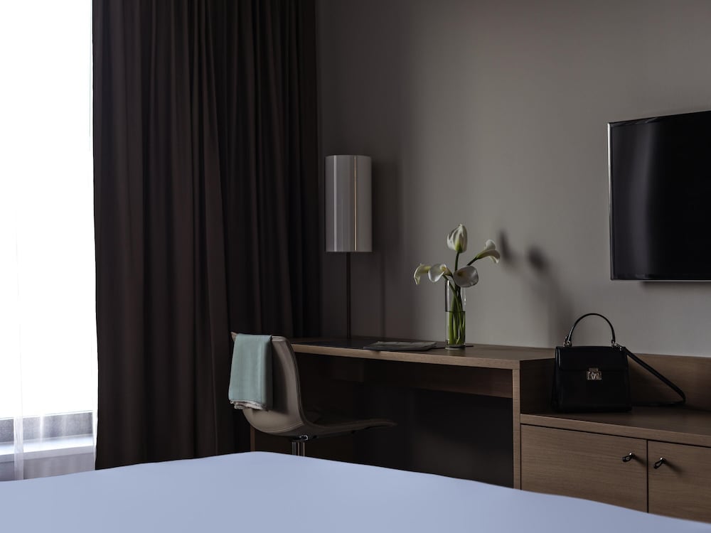 Habitación Doble Superior con dos camas individuales o una cama king - size del hotel Pullman Basel Europe. Foto 4