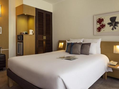 Habitación Doble Estándar del hotel Novotel Geneve Centre. Foto 1