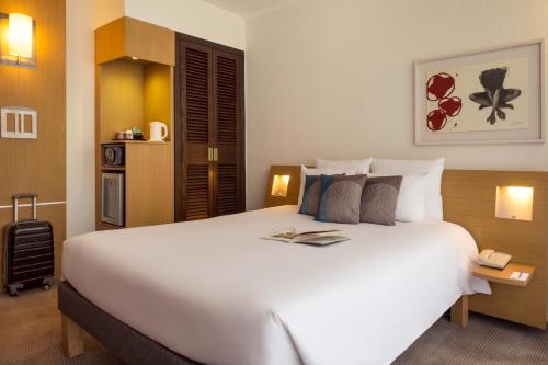 Habitación Doble Estándar del hotel Novotel Geneve Centre. Foto 3