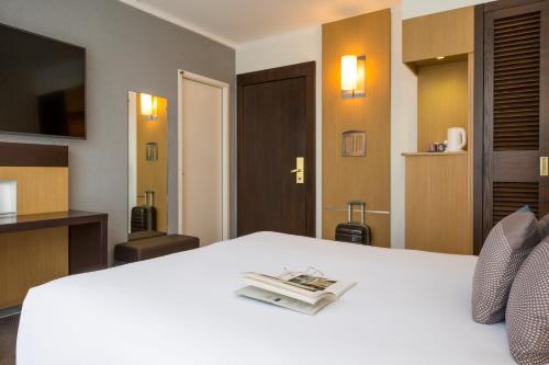 Habitación Doble Estándar del hotel Novotel Geneve Centre. Foto 4