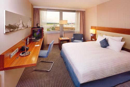 Habitación Clásica con cama extragrande del hotel Mövenpick Hotel Geneva