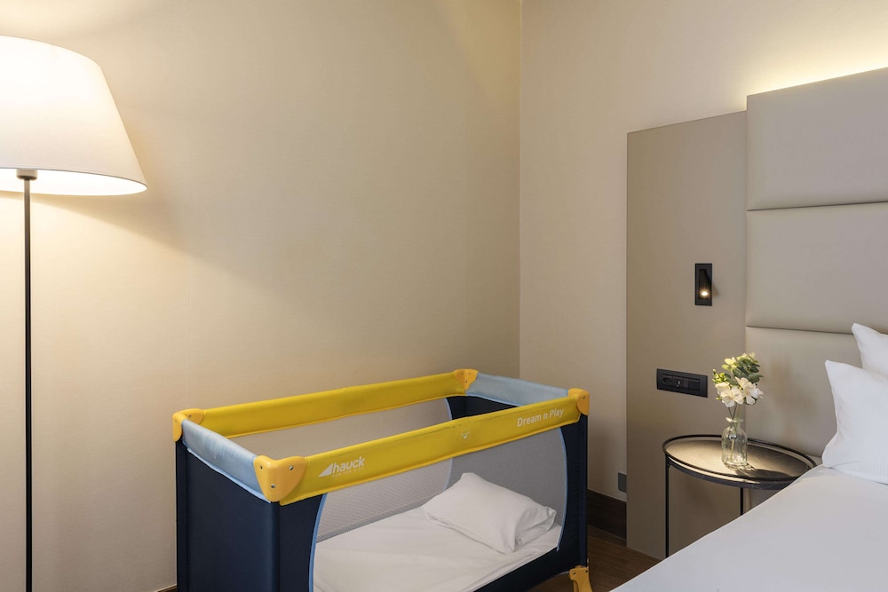 Habitación familiar del hotel Nh Geneva Airport. Foto 2