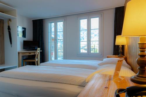 Double Room with Private Bathroom and Eiger View del hotel Jungfrau Lodge Swiss Mountain