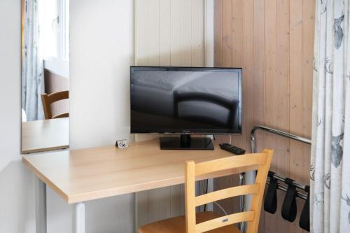 Small Double Room with Private Bathroom (no view) del hotel Jungfrau Lodge Swiss Mountain. Foto 5
