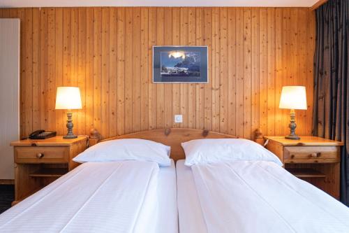 Double Room with Private Bathroom and Eiger View del hotel Jungfrau Lodge Swiss Mountain. Foto 3