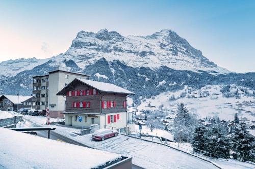 Double Room with Private Bathroom and Eiger View del hotel Jungfrau Lodge Swiss Mountain. Foto 7
