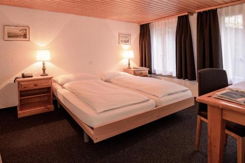 Habitación Triple con baño privado - Sin vistas del hotel Jungfrau Lodge Swiss Mountain