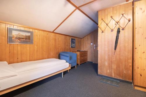 Habitación Cuádruple con baño privado del hotel Jungfrau Lodge Swiss Mountain. Foto 3