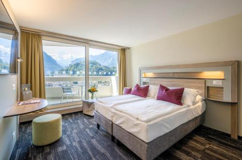Deluxe Double Room - Queen Bed del hotel Metropole Interlaken. Foto 2