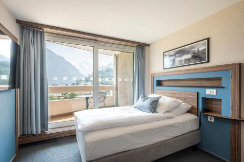 Habitación Individual Deluxe del hotel Metropole Interlaken. Foto 9
