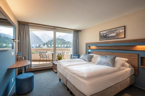 Habitación Doble Deluxe - 2 camas del hotel Metropole Interlaken. Foto 9