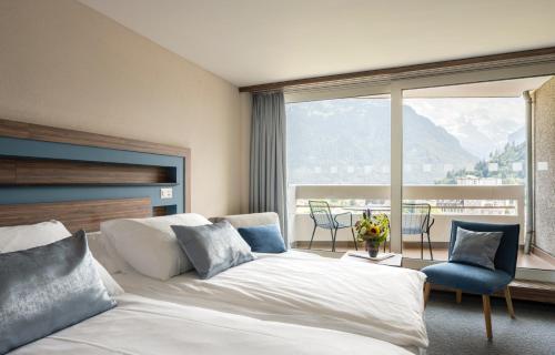 Habitación Doble Deluxe - 2 camas del hotel Metropole Interlaken. Foto 10