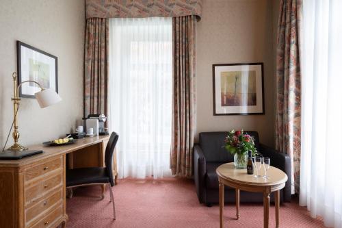 Suite Junior con balcón del hotel Grand Beau Rivage Interlaken. Foto 6