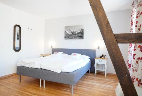 Habitación Doble - 2 camas del hotel Weisses Kreuz. Foto 7