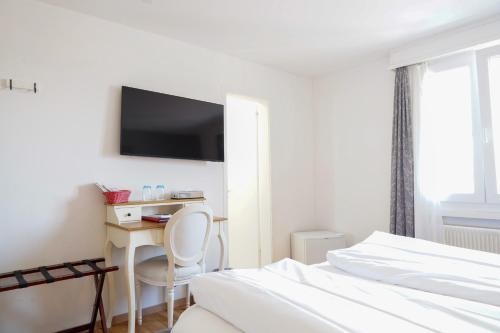 Habitación Doble - 2 camas del hotel Weisses Kreuz. Foto 9