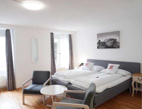 Habitación Triple del hotel Weisses Kreuz. Foto 1