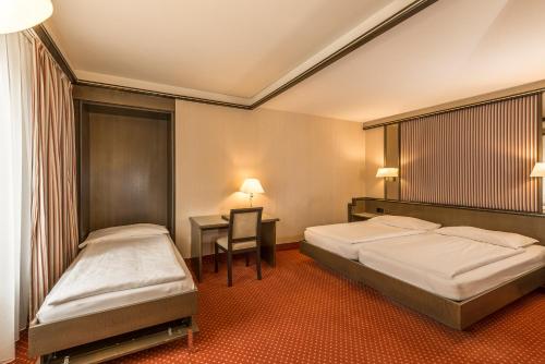 Habitación Triple del hotel Monopol. Foto 5