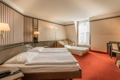 Habitación Triple del hotel Monopol. Foto 7