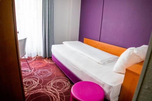 Habitación Individual Estándar del hotel Ibis Styles Luzern. Foto 1