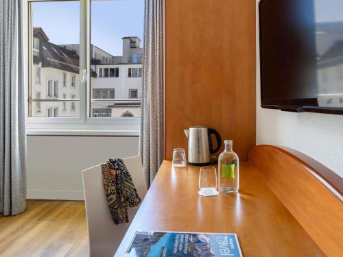 Habitación Individual Estándar del hotel Ibis Styles Luzern. Foto 5