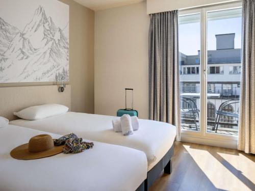 Habitación Doble Estándar - 2 camas del hotel Ibis Styles Luzern. Foto 10