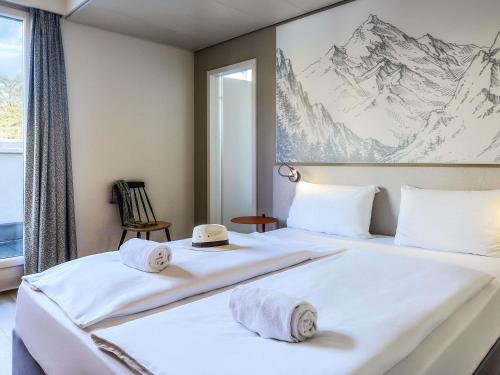 Habitación Estándar - Cama extragrande del hotel Ibis Styles Luzern. Foto 6